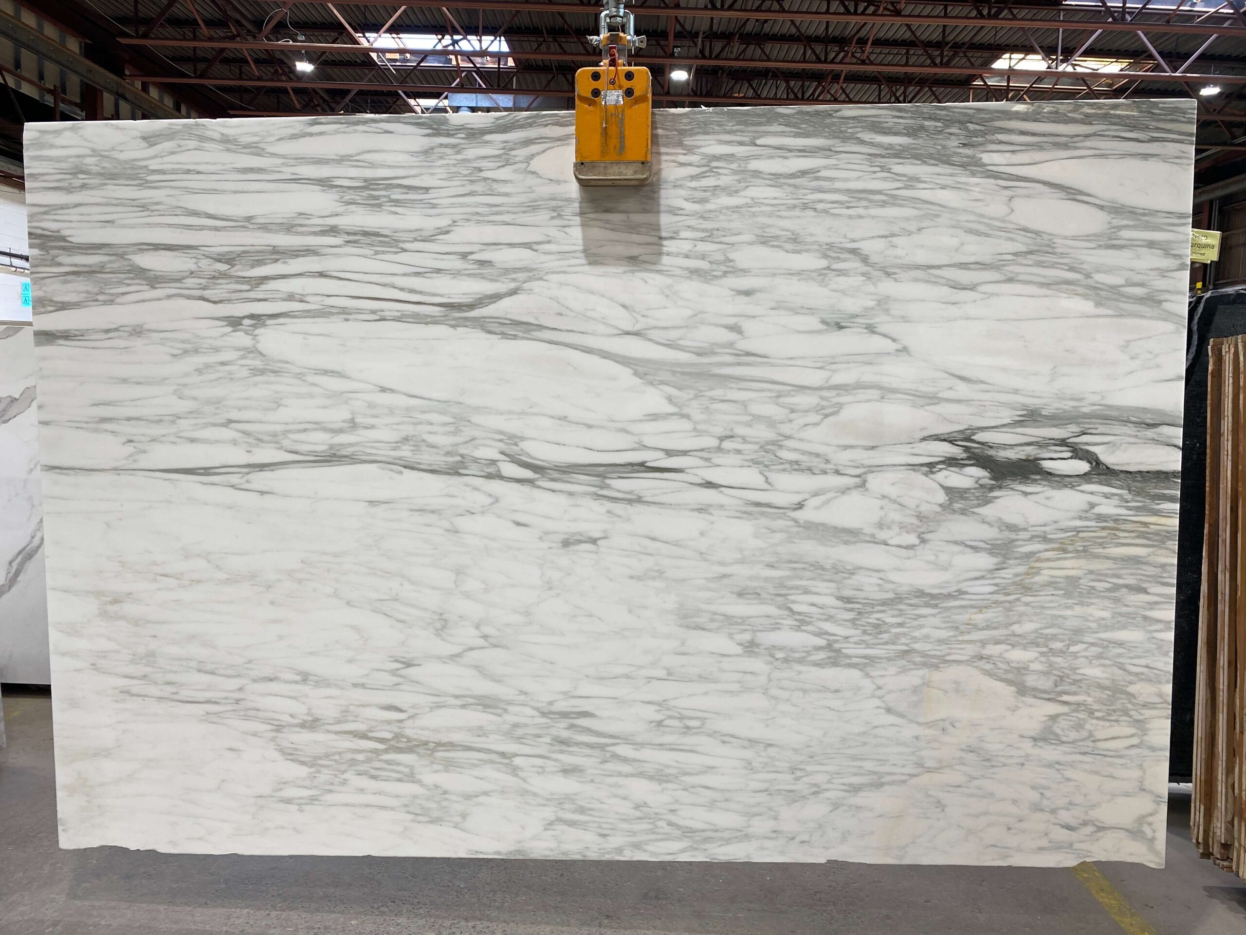The pristine white surface of this Calacatta Caldia marble is perfectly accentuated by prominent gray veins and a subtler vein pattern, making this stone a popular choice. Calacatta Caldia - Lot 2415 2cm Polished & Honed, 118" x 77" | Arena Stone NJ Arena stone nj calacatta caldia lot 2415 2cm polished honed calacatta caldia lot 2415 2cm polished honed 118 x 77