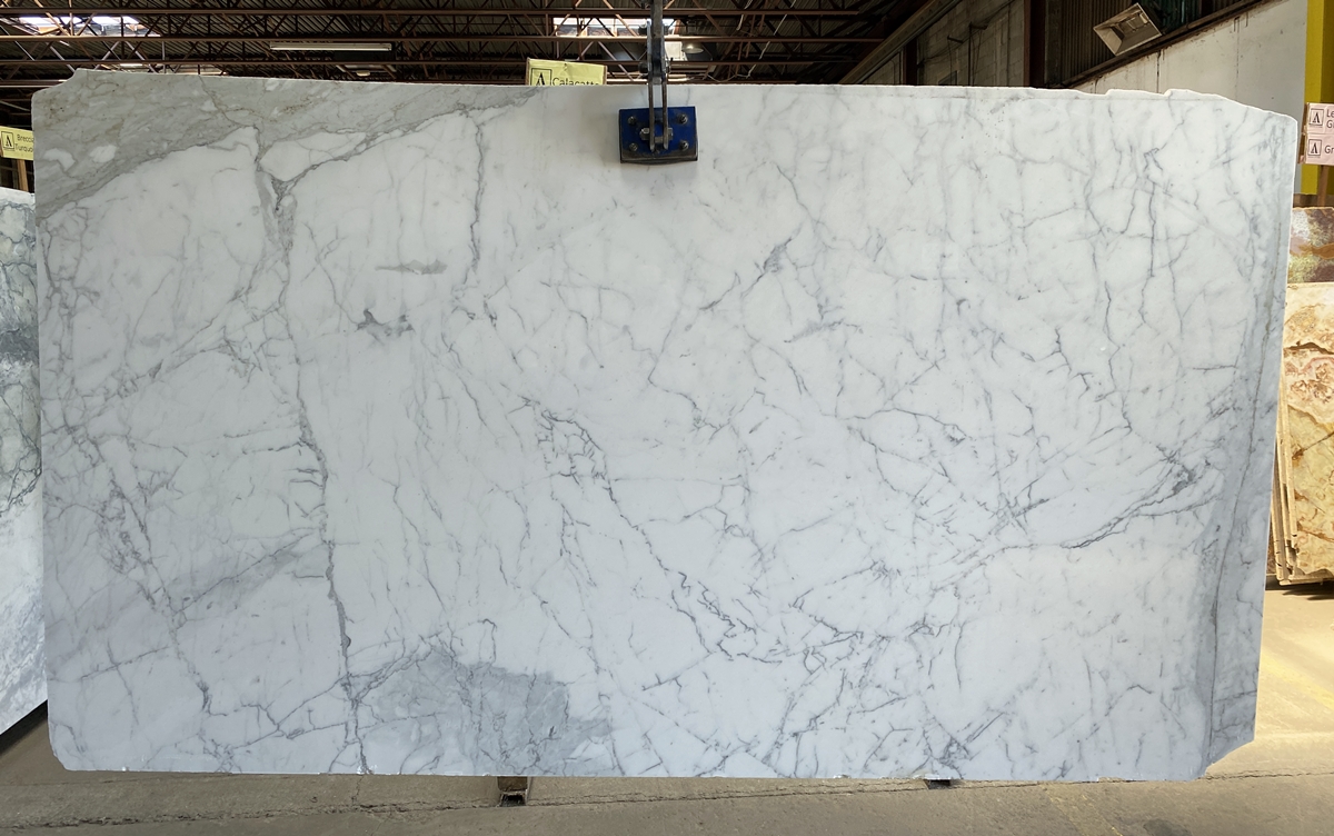 Statuario - This exquisite marble stone boasts a bright white background with thick, well-defined grey veins creating a striking contrast against the pure white base. Statuario- Lot 1773 #63 2cm Polished, 118x66 | Arena Stone NJ Arena stone nj statuario lot 1773 2cm polished statuario lot 1773 63 2cm polished 118x66