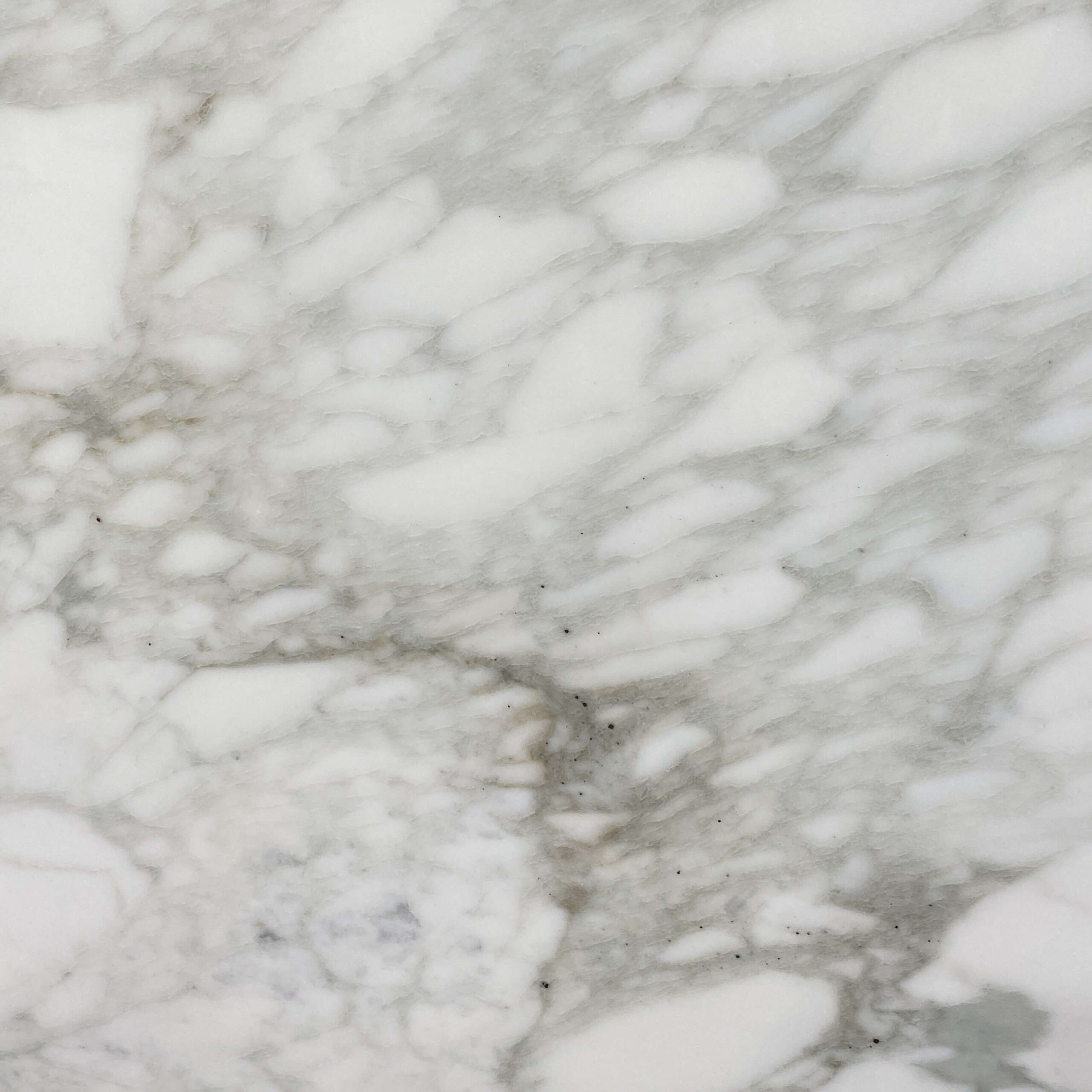 The milky white surface of our Calacatta Caldia marble is delightfully decorated with shades of large, light grey brecciated accents. Calacatta Caldia - Lot 2414 | Arena Stone NJ Arena stone nj calacatta caldia lot 2414 2cm polished honed calacatta caldia lot 2414