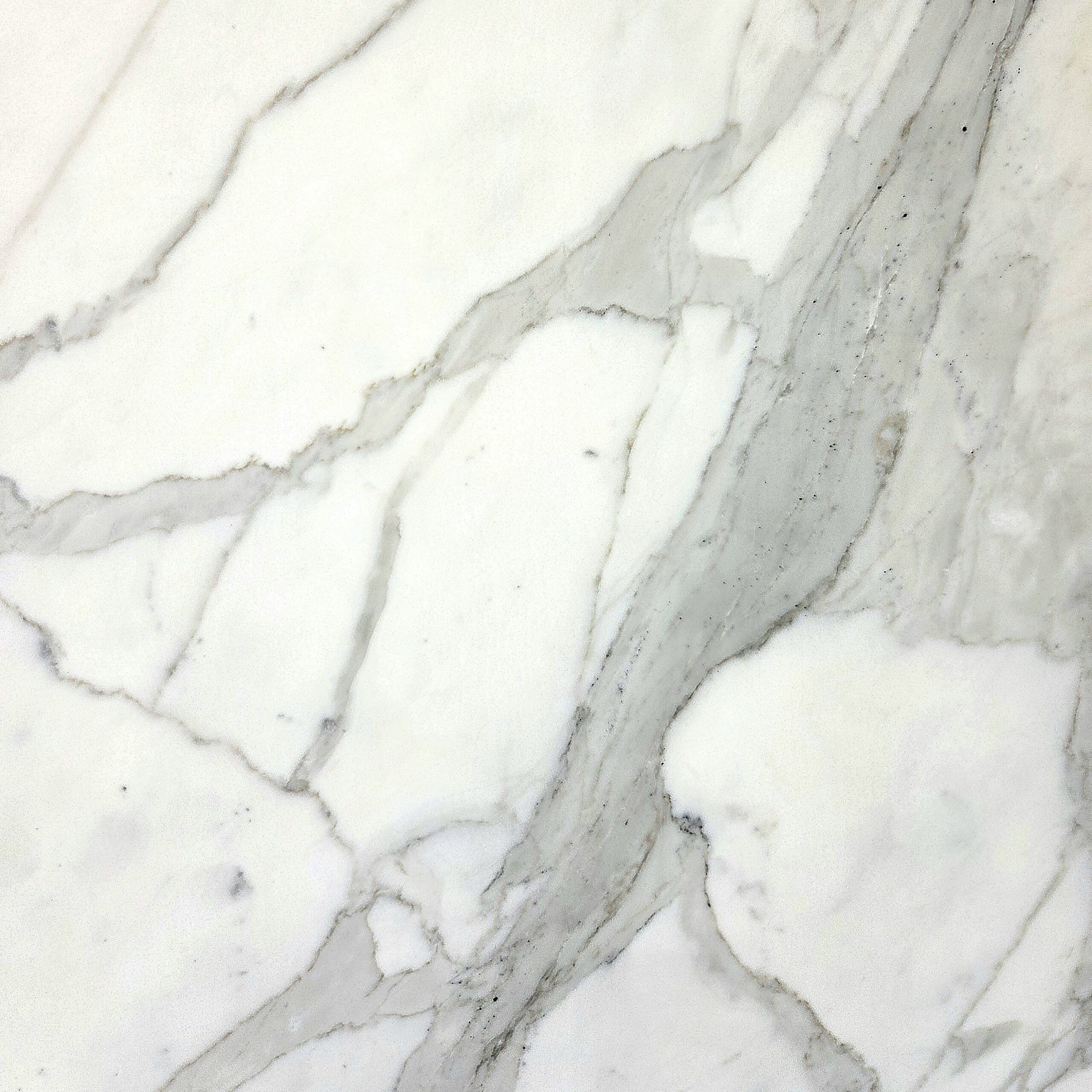 Elevate your interior with Calacatta marble, offering a pristine white canvas with elegant, sweeping grey veins. Ideal for expansive, luxury interior projects. Calacatta - Lot 2590 | Arena Stone NJ Arena stone nj calacatta lot 2590 2cm polished calacatta lot 2590