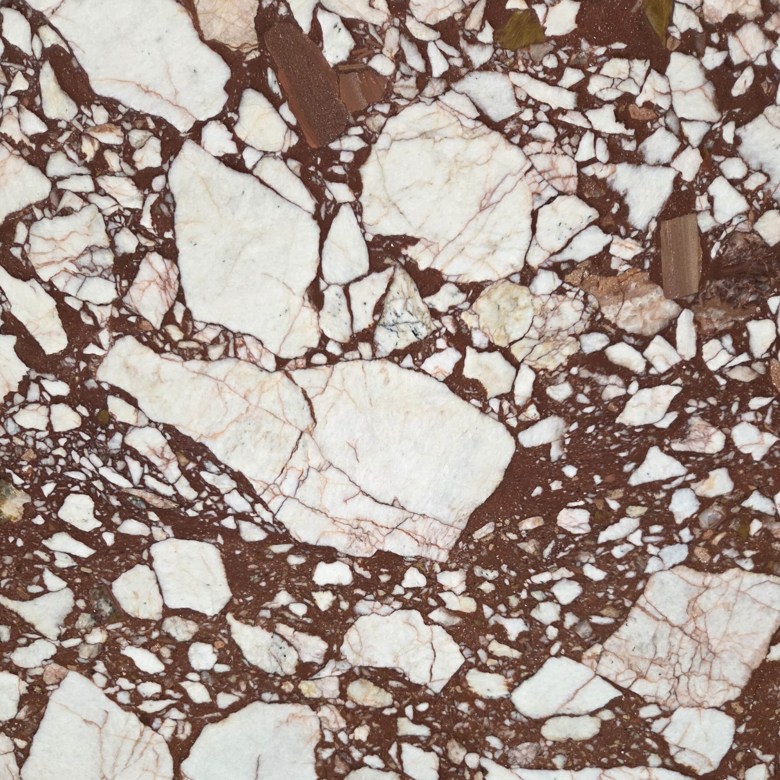 The bold elegance of our Calacatta Red marble. This honed stone features a dramatic brecciated pattern of vibrant red interspersed with crisp white fragments. Calacatta Red - Lot 2596 | Arena Stone NJ Arena stone nj calacatta red lot 2596 2cm honed calacatta red lot 2596