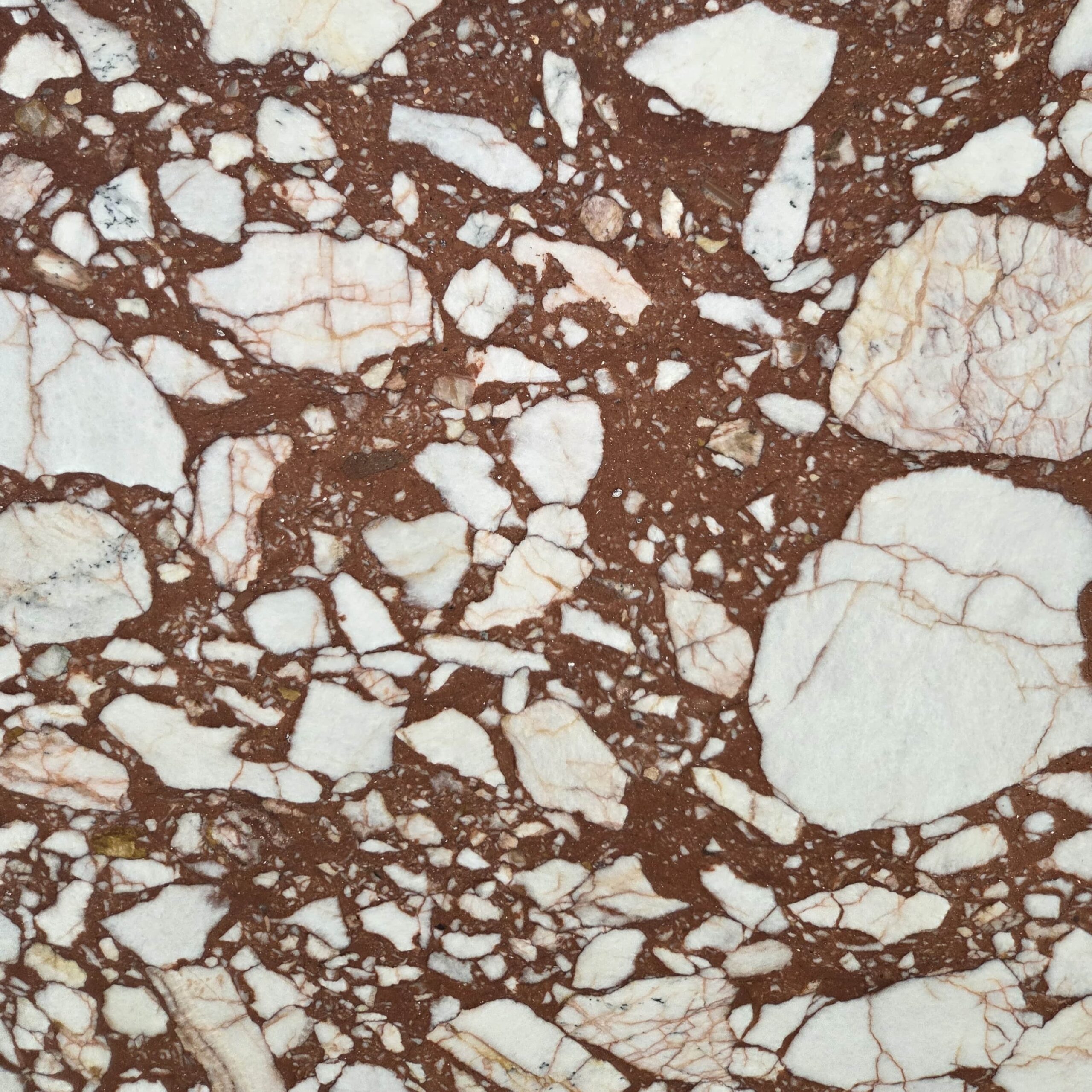 The bold elegance of our Calacatta Red marble. This honed stone features a dramatic brecciated pattern of vibrant red interspersed with crisp white fragments. Calacatta Red - Lot 2596 | Arena Stone NJ Arena stone nj calacatta red lot 2596 2cm honed calacatta red lot 2596