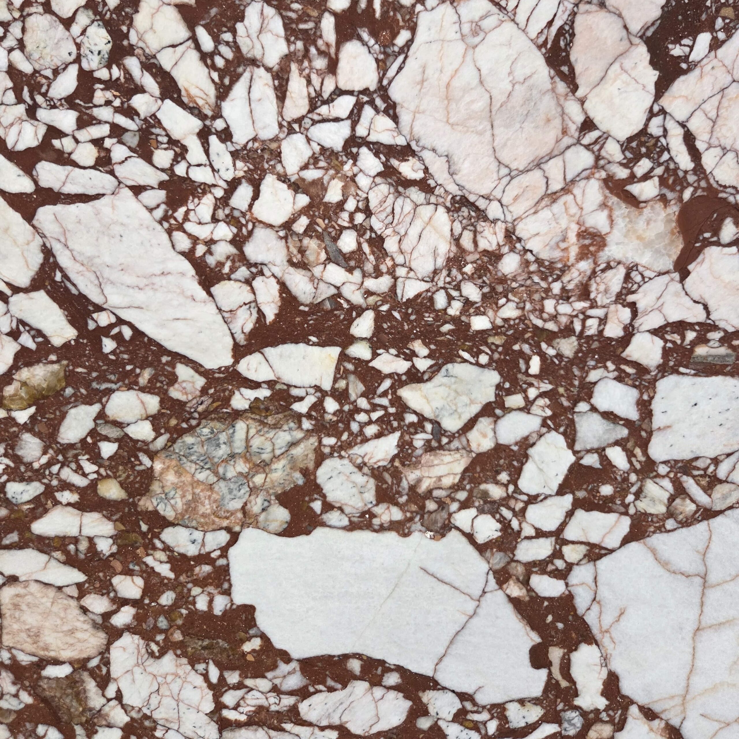 The bold elegance of our Calacatta Red marble. This honed stone features a dramatic brecciated pattern of vibrant red interspersed with crisp white fragments. Calacatta Red - Lot 2596 | Arena Stone NJ Arena stone nj calacatta red lot 2596 2cm honed calacatta red lot 2596