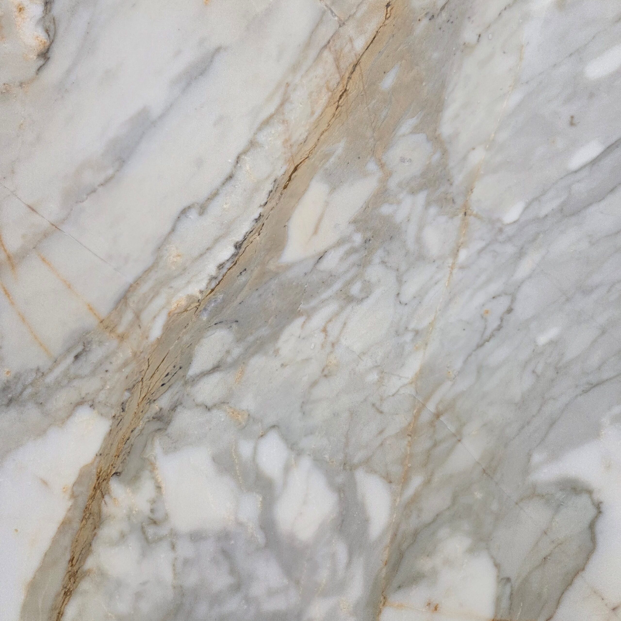 Our Calacatta Macchia Vecchia marble featuring a creamy white base with bold gold, taupe, and grey veining for a dramatic, high end stone aesthetic. Calacatta Macchia Vecchia - Lot 2622 | Arena Stone NJ Arena stone nj calacatta macchia vecchia lot 2622 2cm honed calacatta macchia vecchia lot 2622