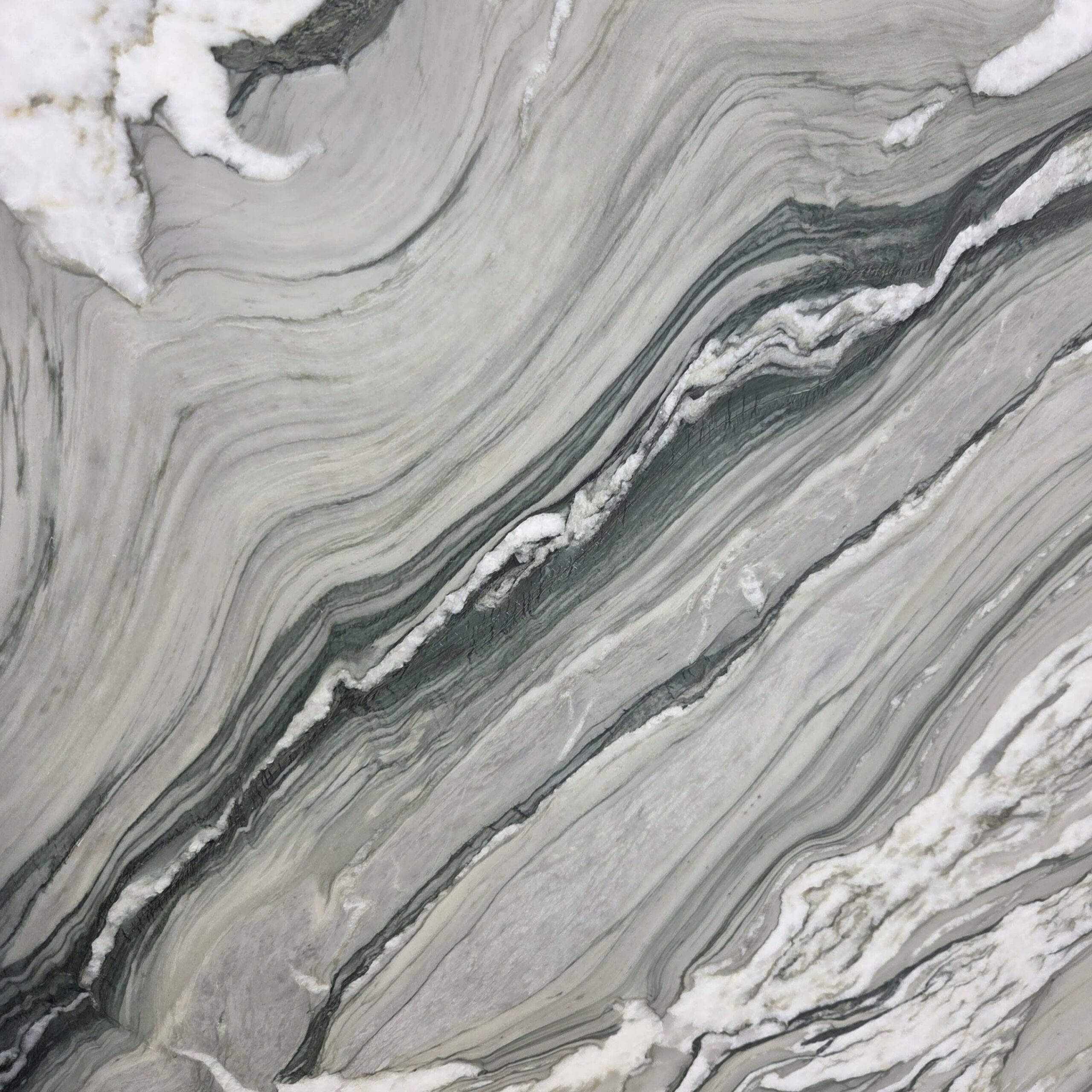 Earth's artistry captured. Our amazing Cipollino Green has layered texture including a vibrant green and grey palette, as well as sharp, flowing white veins. Cipollino Green - Lot 2605 | Arena Stone NJ Arena stone nj cipollino green lot 2605 2cm polished cipollino green lot 2605