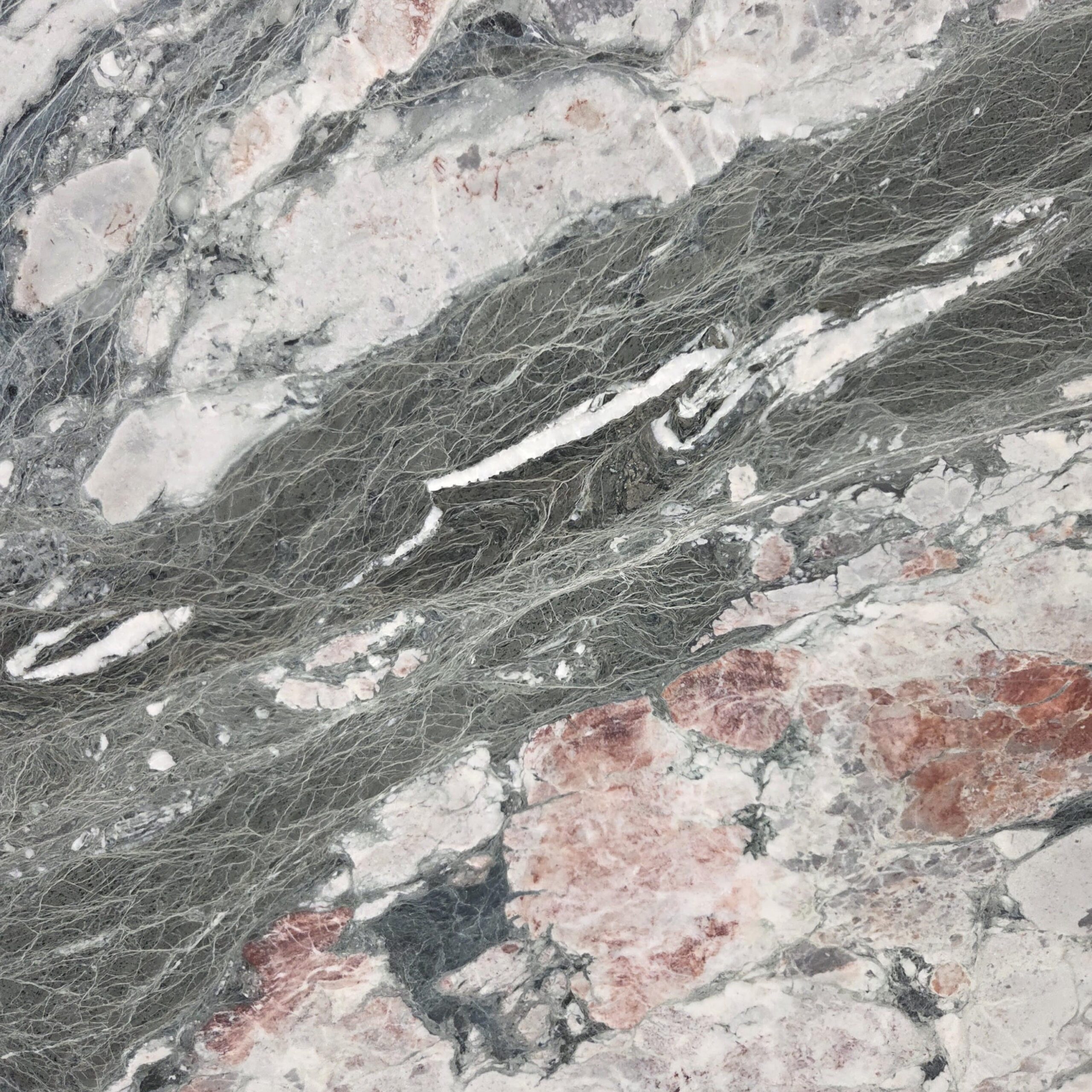 A masterpiece of nature. Our Four Seasons marble blends bold grey, green, and striking red veins on a cool white canvas. The rich patterns create a high impact texture. Four Seasons - Lot 2606 | Arena Stone NJ Arena stone nj four seasons lot 2606 2cm honed four seasons lot 2606