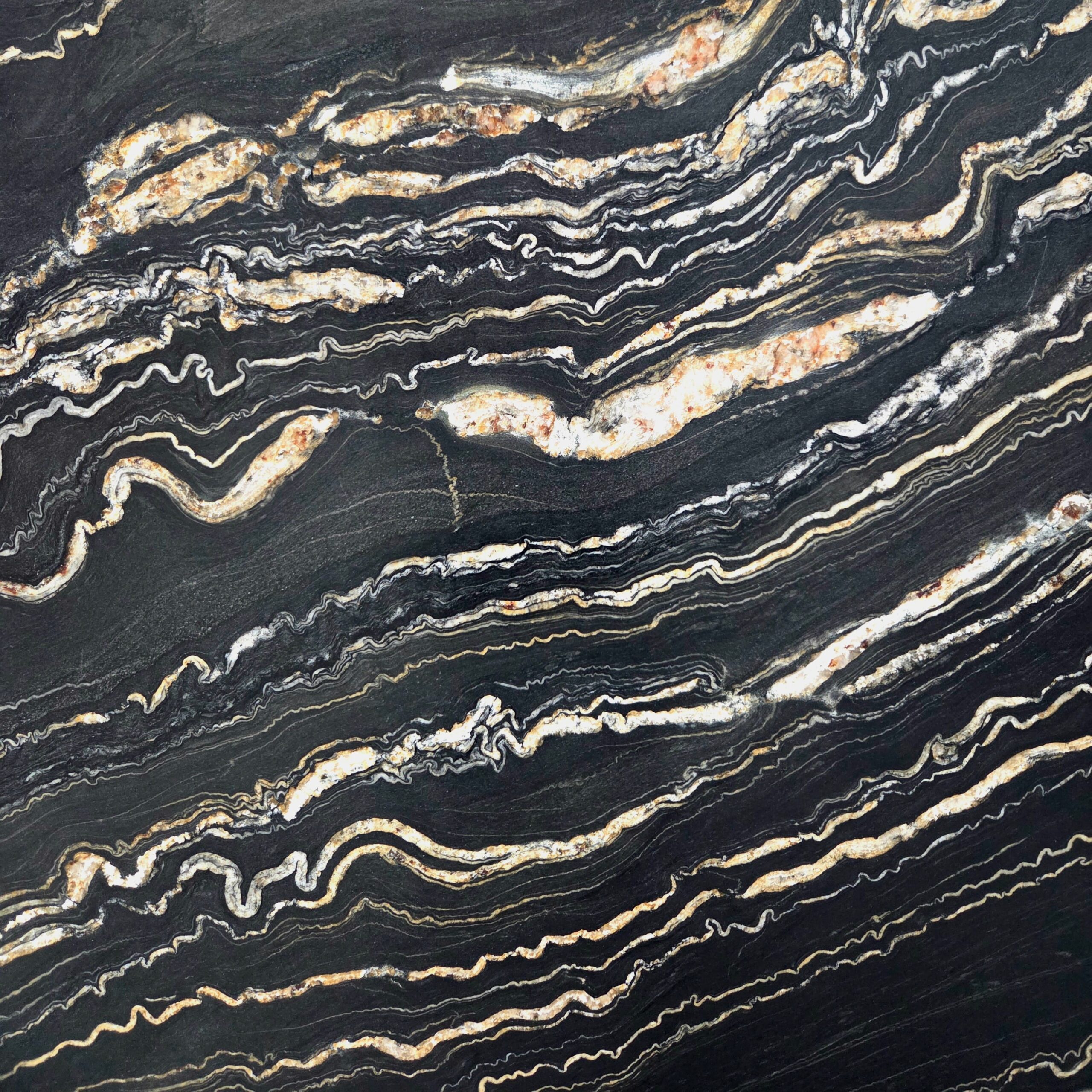 Portoro Quartzite features a dramatic black background layered with striking gold and ivory veining. This leathered natural stone adds bold movement, depth, and luxurious contrast to high end interiors. Quartzite Portoro - Lot 2615 | Arena Stone NJ Arena stone nj quartzite portoro lot 2615 2cm leathered quartzite portoro lot 2615